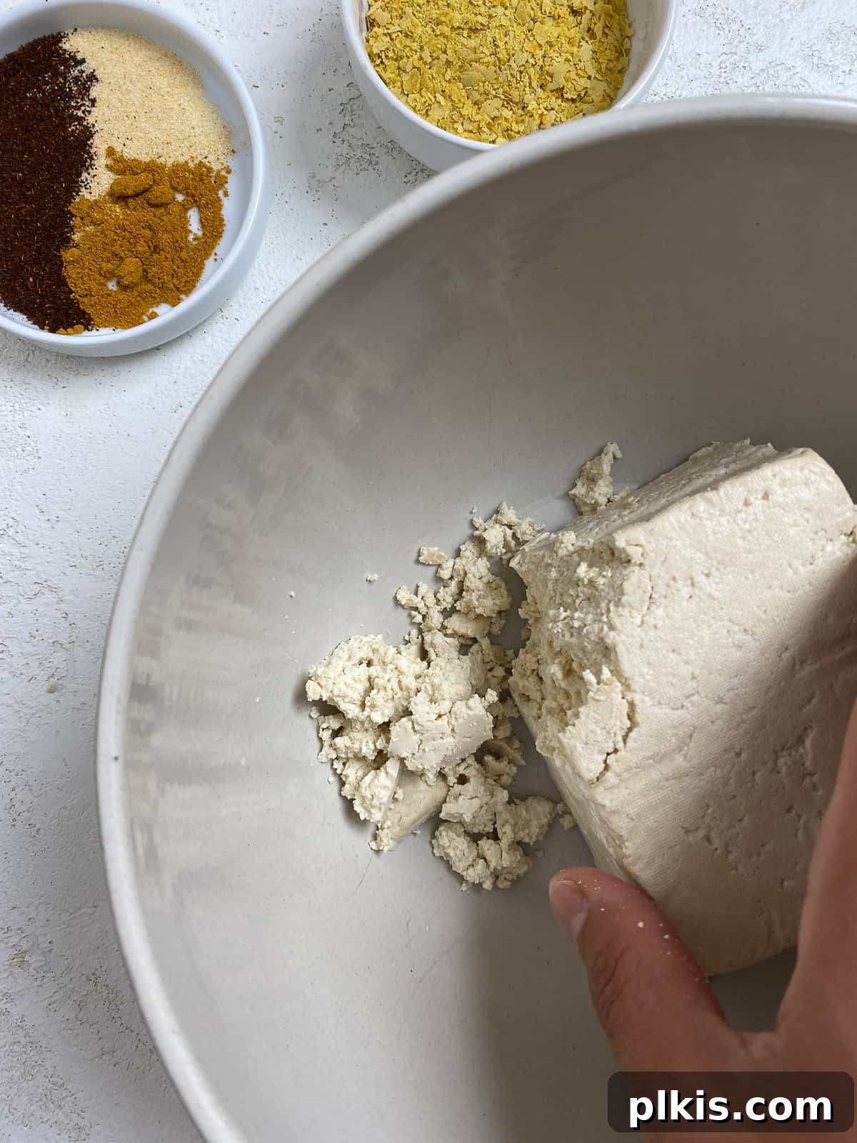 Effortless Plant-Based Breakfast Wrap 4 process shot of crumbling tofu