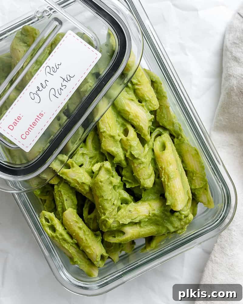 Emerald Pea Pasta 9 Green Pea Pasta stored neatly in an airtight glass container, perfect for meal prep and leftovers.