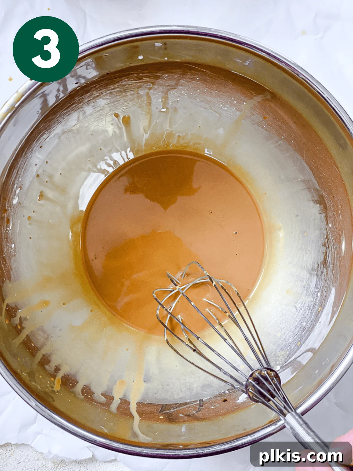 Crispy Tangy Tofu Delight 6 Close-up of cornstarch and soy sauce being whisked for the tofu coating.