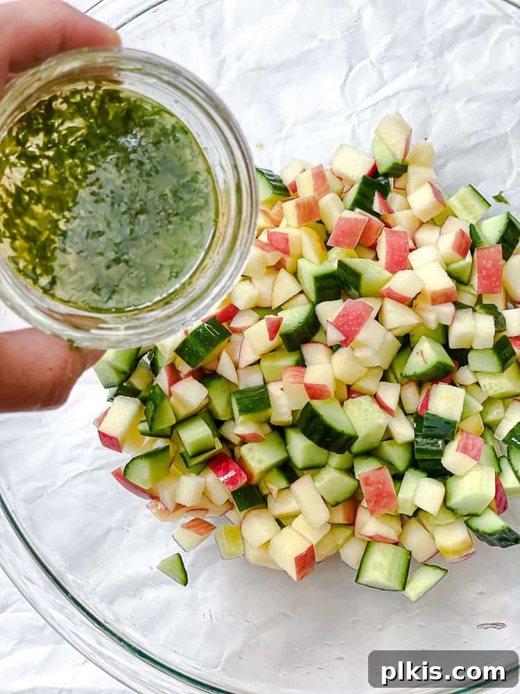 Zesty Apple Cucumber Delight 7 process shot of adding dressing ingredients to bowl