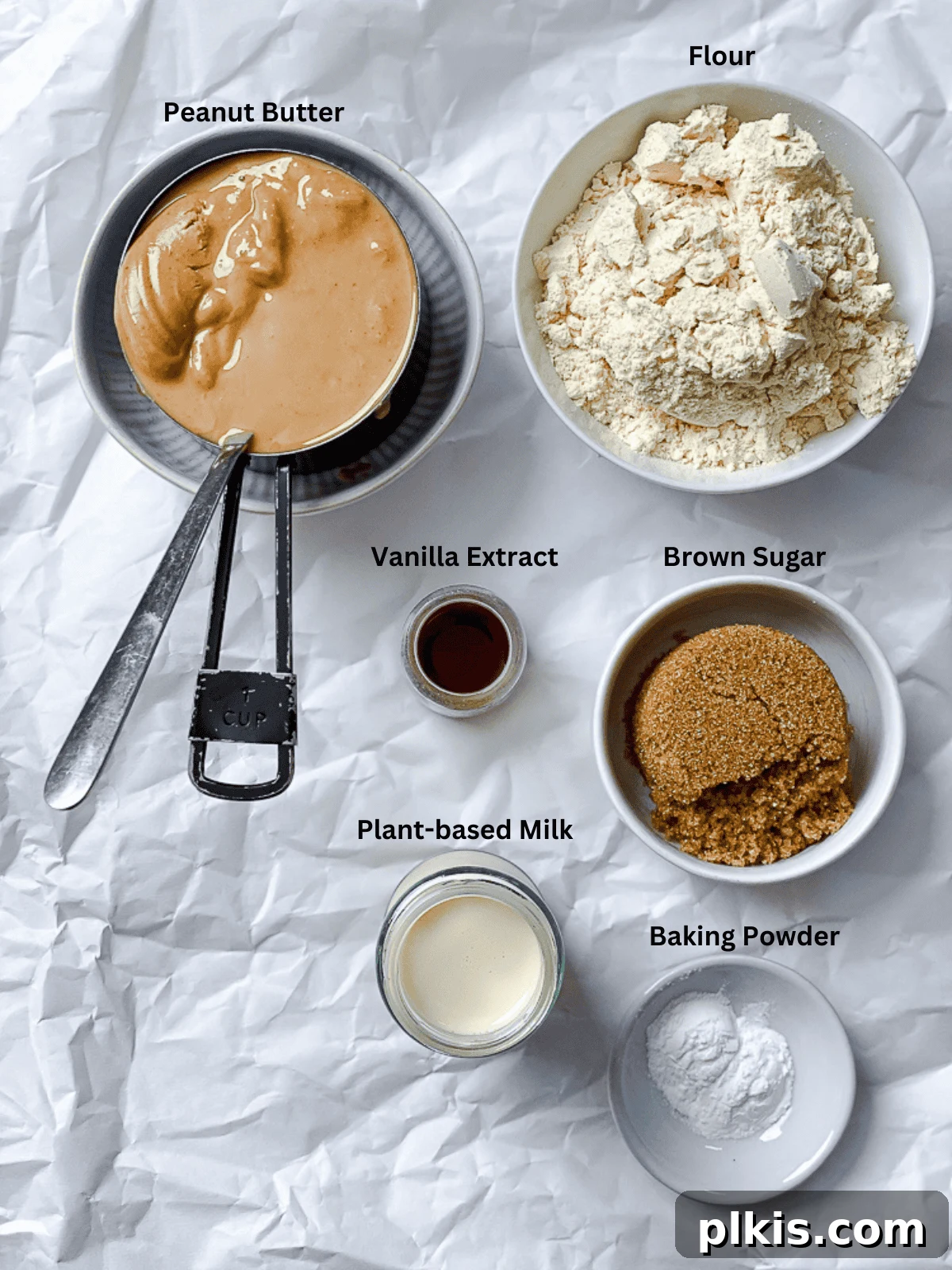 Plant-Based Peanut Butter Perfection 3 ingredients for Vegan Peanut Butter Cookies measured out on a white surface