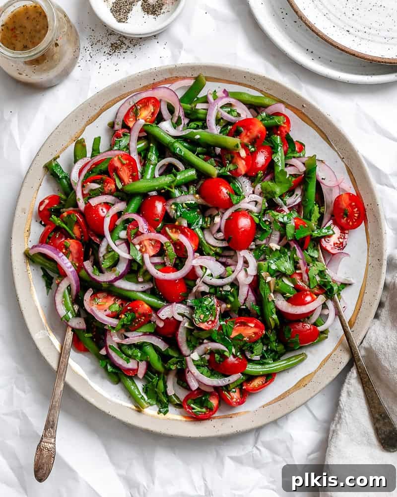 Zesty Green Bean Salad 8 completed Green Bean Salad plated with a fork