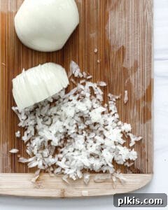 Crispy Quinoa Bites 4 cut up onion on a brown cutting board