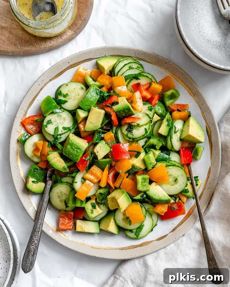 Crisp Cucumber and Pepper Medley 2 A beautifully plated Cucumber and Bell Pepper Salad, showcasing vibrant colors and fresh ingredients.