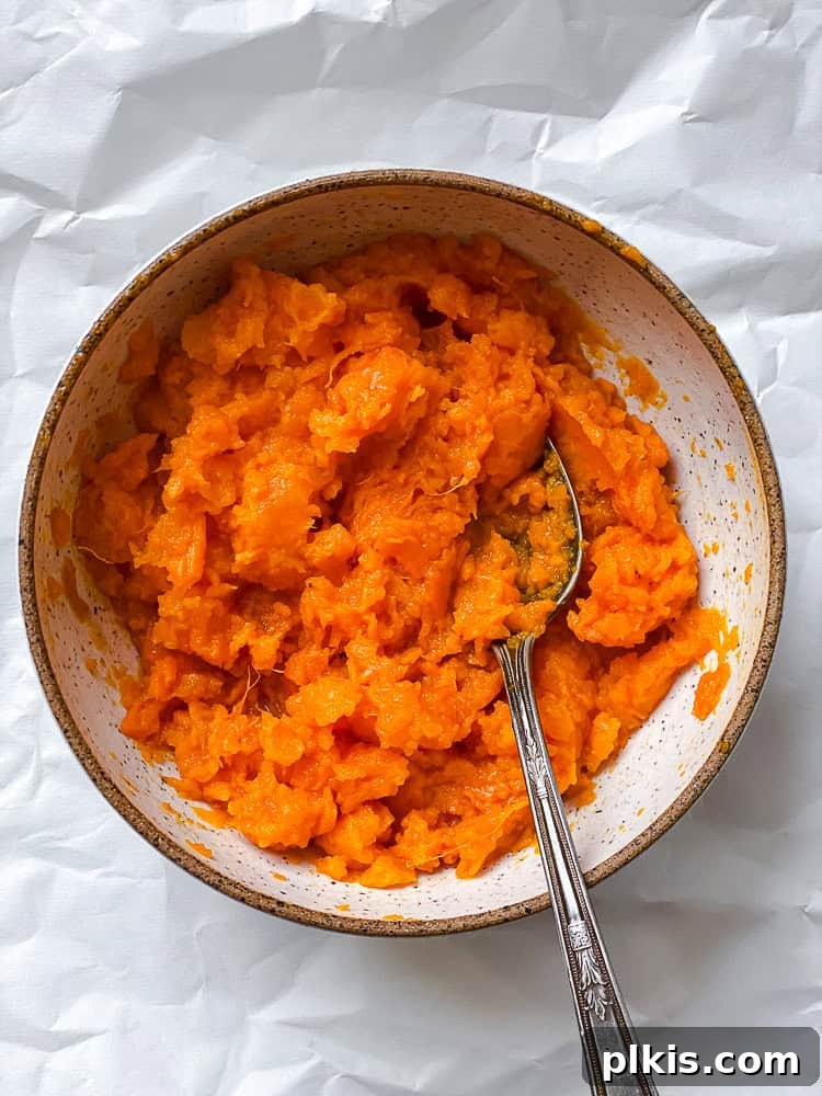 Hearty Sweet Potato Black Bean Tacos 7 Creamy mashed sweet potatoes in a bowl, ready to be seasoned and used as a taco filling.