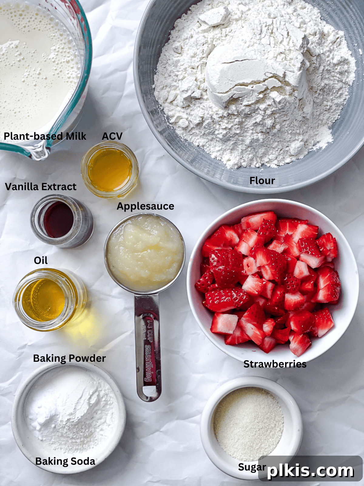 ingredients for Strawberry Pancakes [Eggless & Dairy-Free] measured out on a white surface