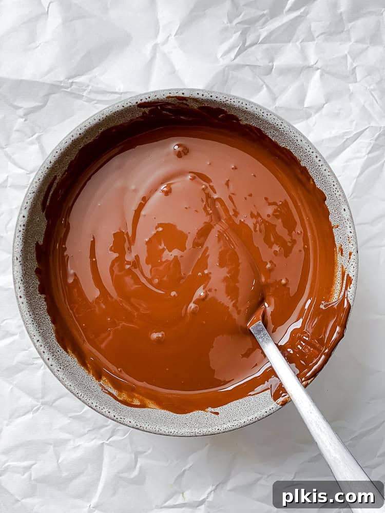 Decadent Dairy-Free Fudge Pops 4 process shot showing vegan chocolate melted in bowl