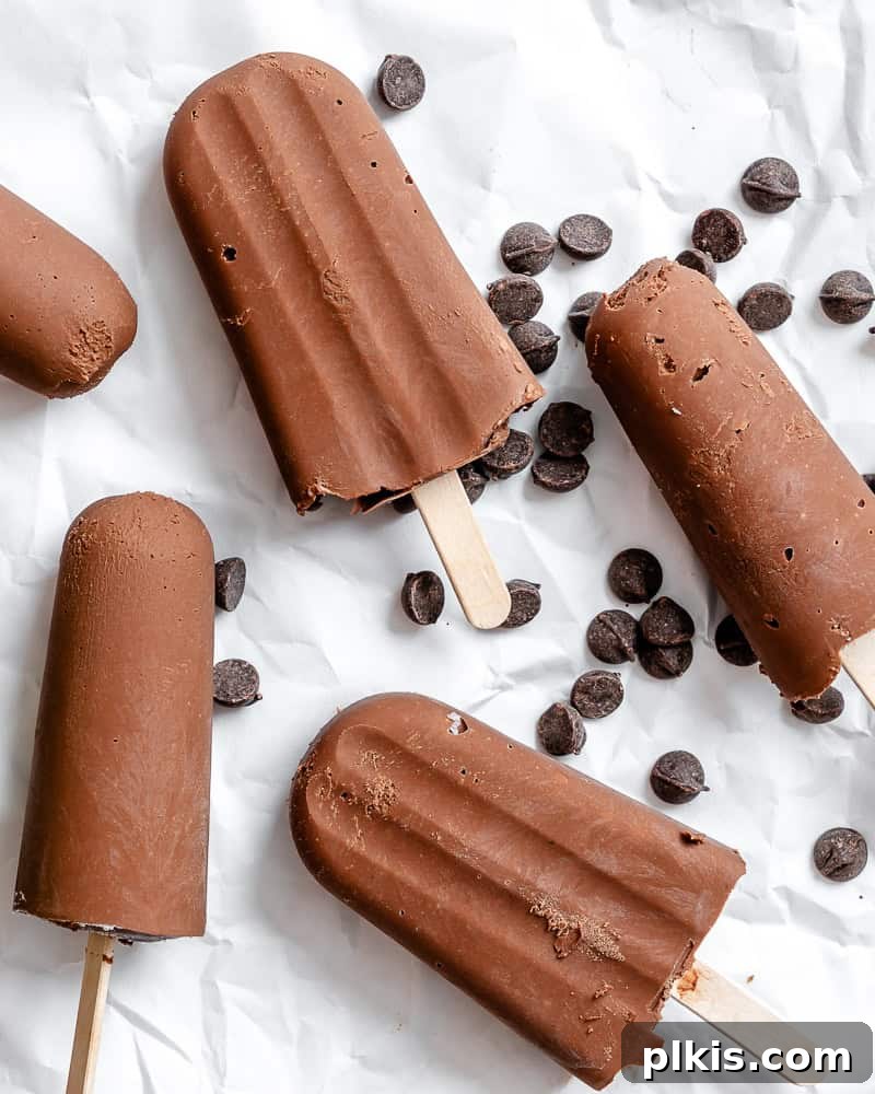 Decadent Dairy-Free Fudge Pops 7 completed Vegan Fudgesicles on a white surface