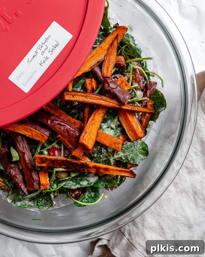 Vibrant Sweet Potato Kale Salad 10 Completed Sweet Potato and Kale Salad stored in a meal prep container.
