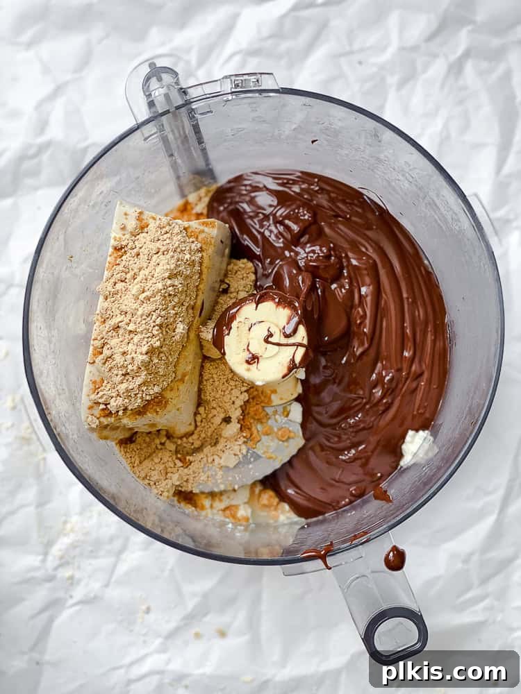 Protein-Packed Chocolate Peanut Butter Pops 5 Blending melted chocolate, silken tofu, and peanut butter powder