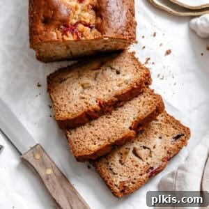 completed Easy Apricot Bread on a white surface