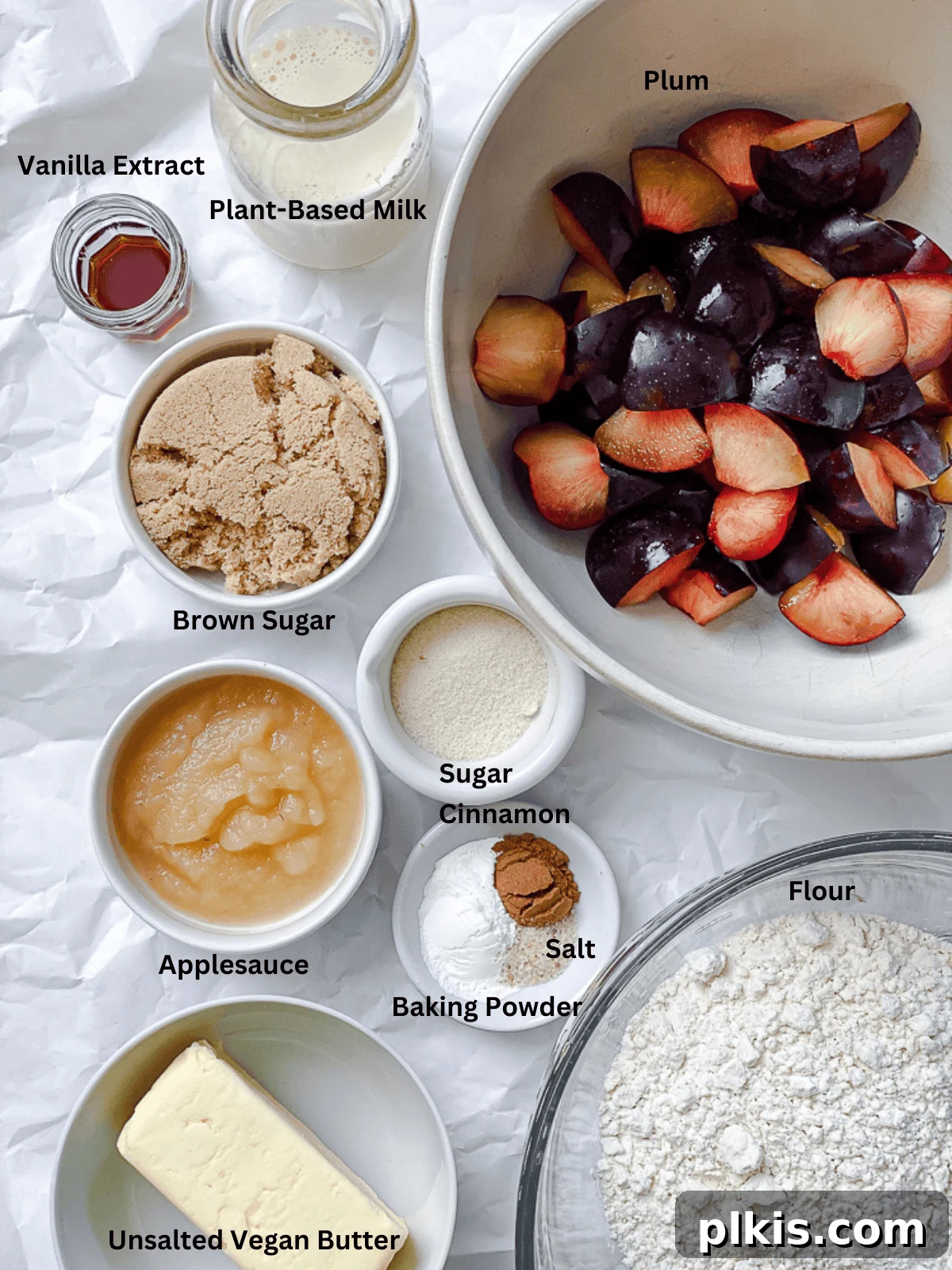 Effortless Plum Perfection 3 ingredients for Easy Plum Cake measured out on a white surface