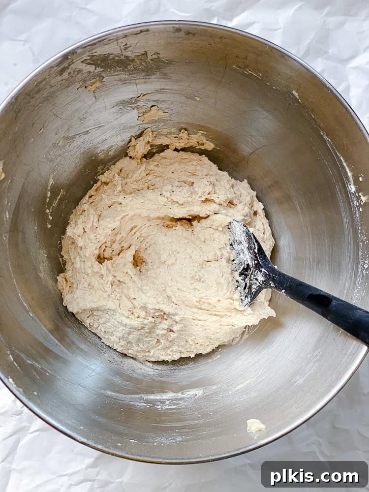 Effortless Plum Perfection 6 process shot showing mixing cake batter in bowl