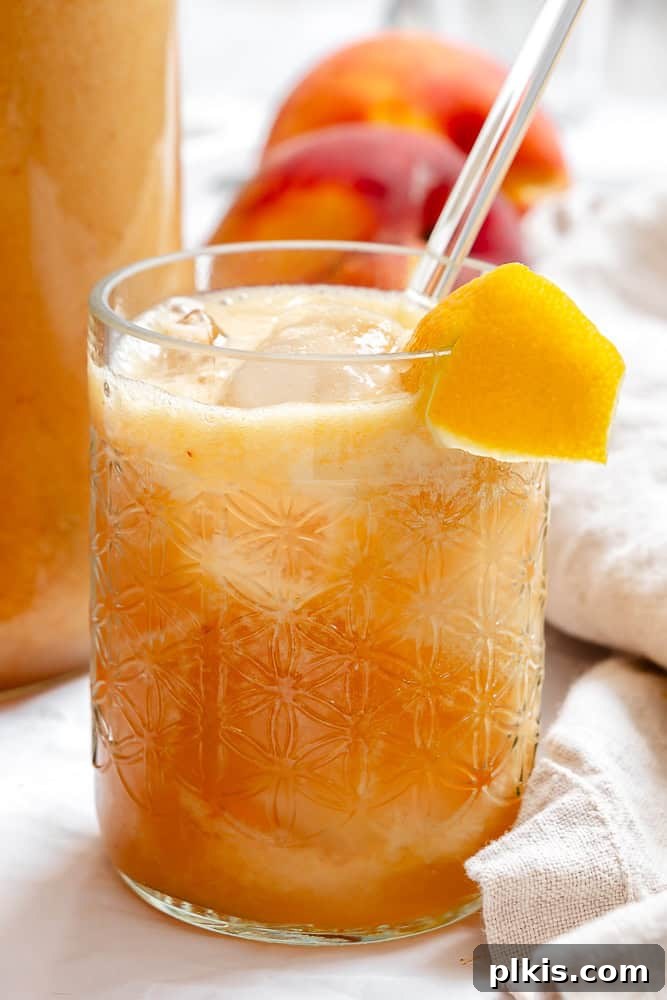 Golden Peach Lemonade 2 close up on a glass of Peach Lemonade.