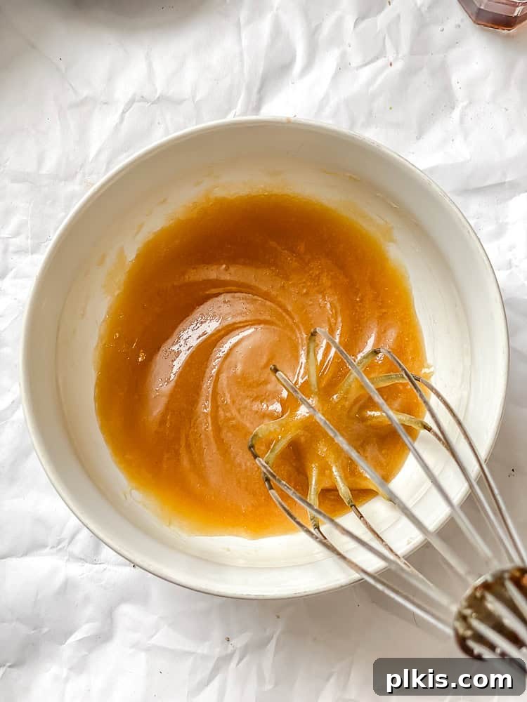 Strawberry Crown Cake 4 process shot showing mixing vegan butter and sugars in bowl to create the caramel topping
