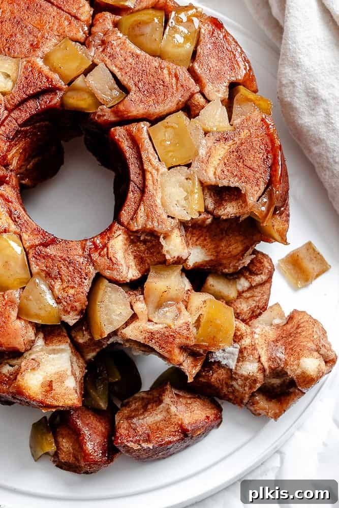 Sweet Apple Monkey Delight 9 A beautifully completed Easy Apple Monkey Bread, artfully presented on a white surface