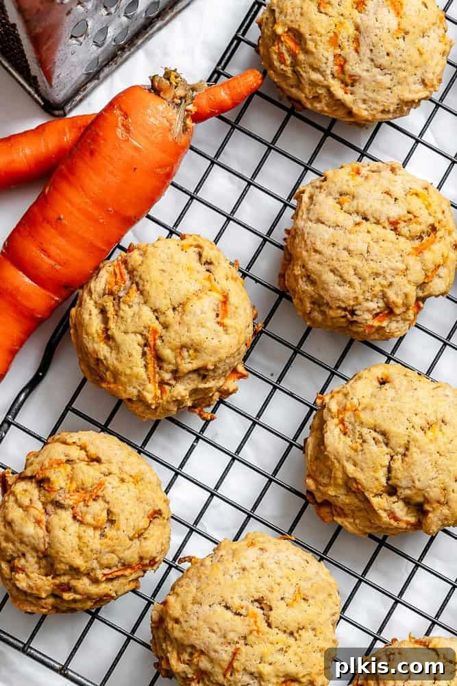 Spiced Carrot Cake Cookies 8 Close-up of a completed Vegan Carrot Cake Cookie on a cooling rack, showing its soft texture.