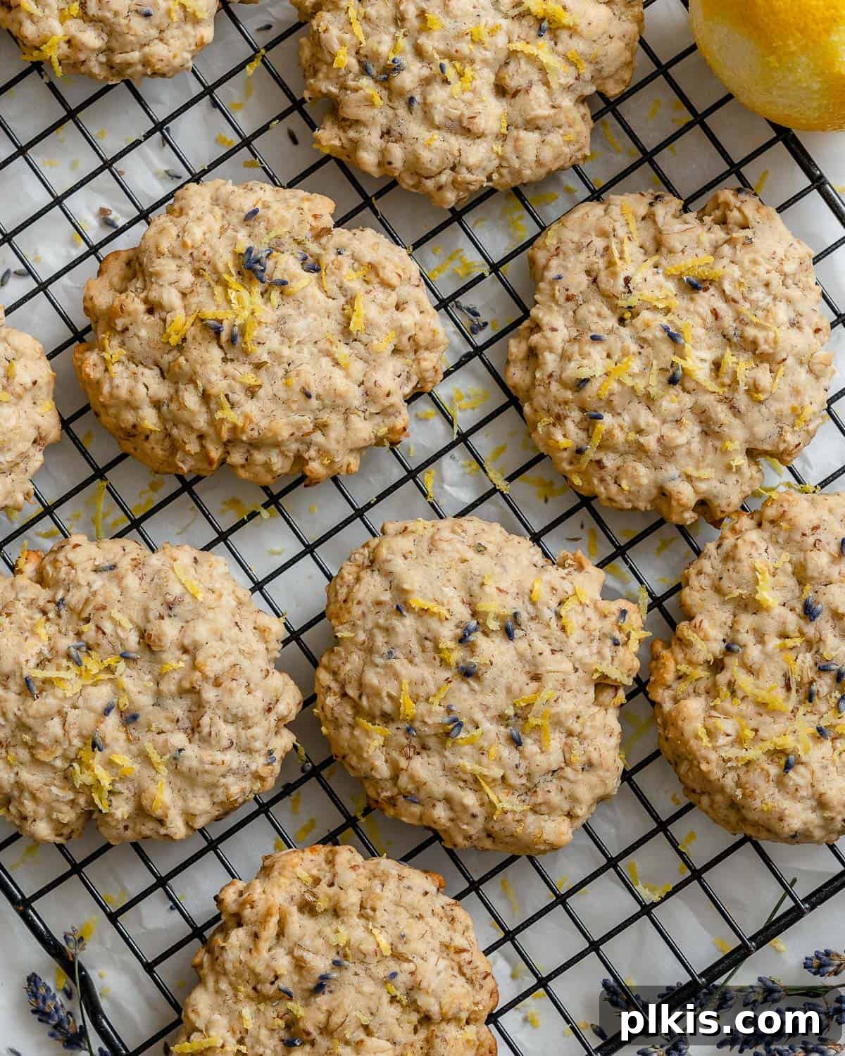 Vegan Lemon Lavender Cookies Beautifully glazed lemon lavender cookies cooling on a wire rack, ready to be enjoyed.