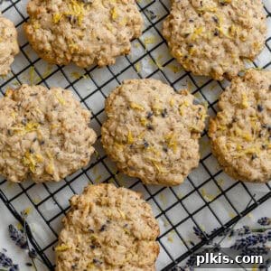 Completed Lemon Lavender Cookies on a cooling rack, drizzled with lemon glaze.
