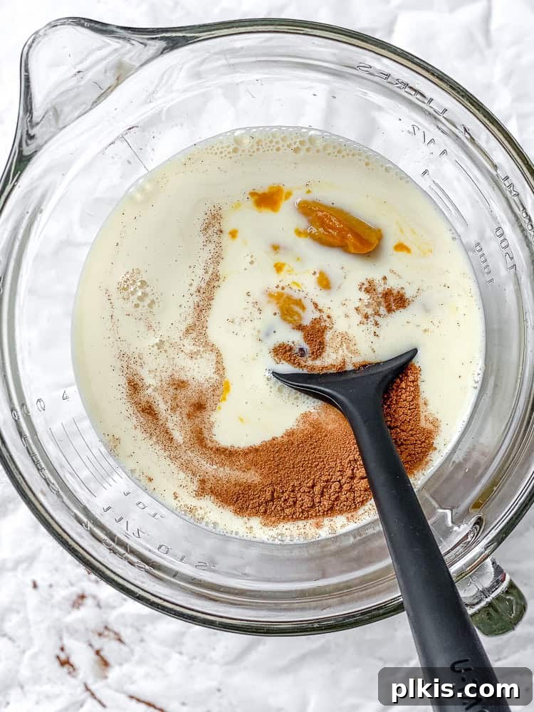 Cozy Pumpkin Spice Pudding 5 process shot showing mixing ingredients in a bowl