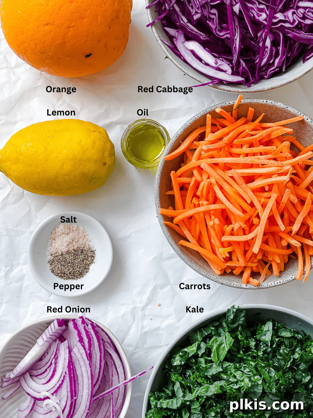 Zesty Kale Slaw Delight 3 ingredients for Crunchy Kale Slaw measured out on a white surface