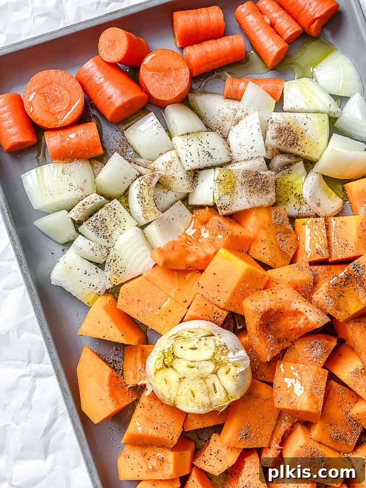 Golden Harvest Bisque 4 ingredients for Roasted Pumpkin Soup on baking tray before roasting