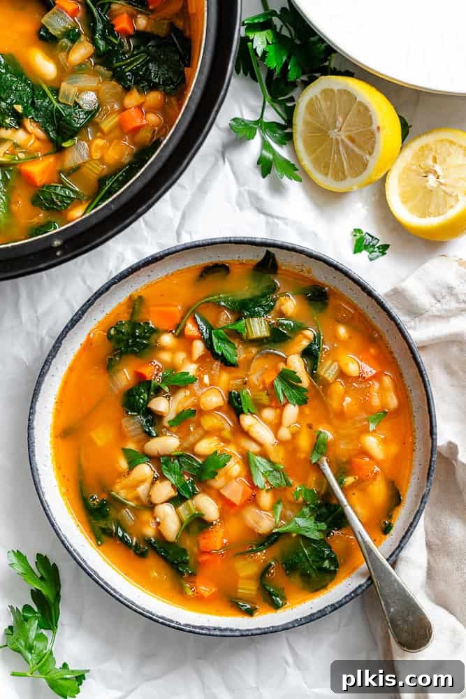 completed Tuscan White Bean Soup [With Kale] in a pot