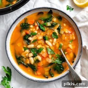 completed Tuscan White Bean Soup [With Kale] in a pot