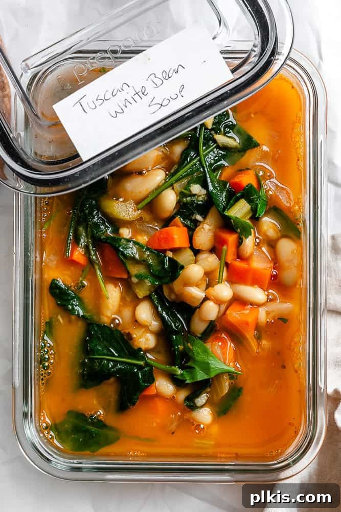 completed Tuscan White Bean Soup [With Kale] in a storage container