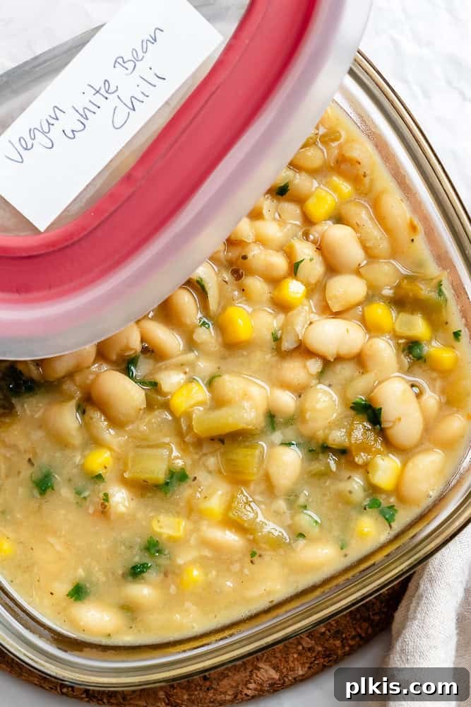Creamy Plant-Based White Bean Chili 9 completed Vegan White Bean Chili in a storage container