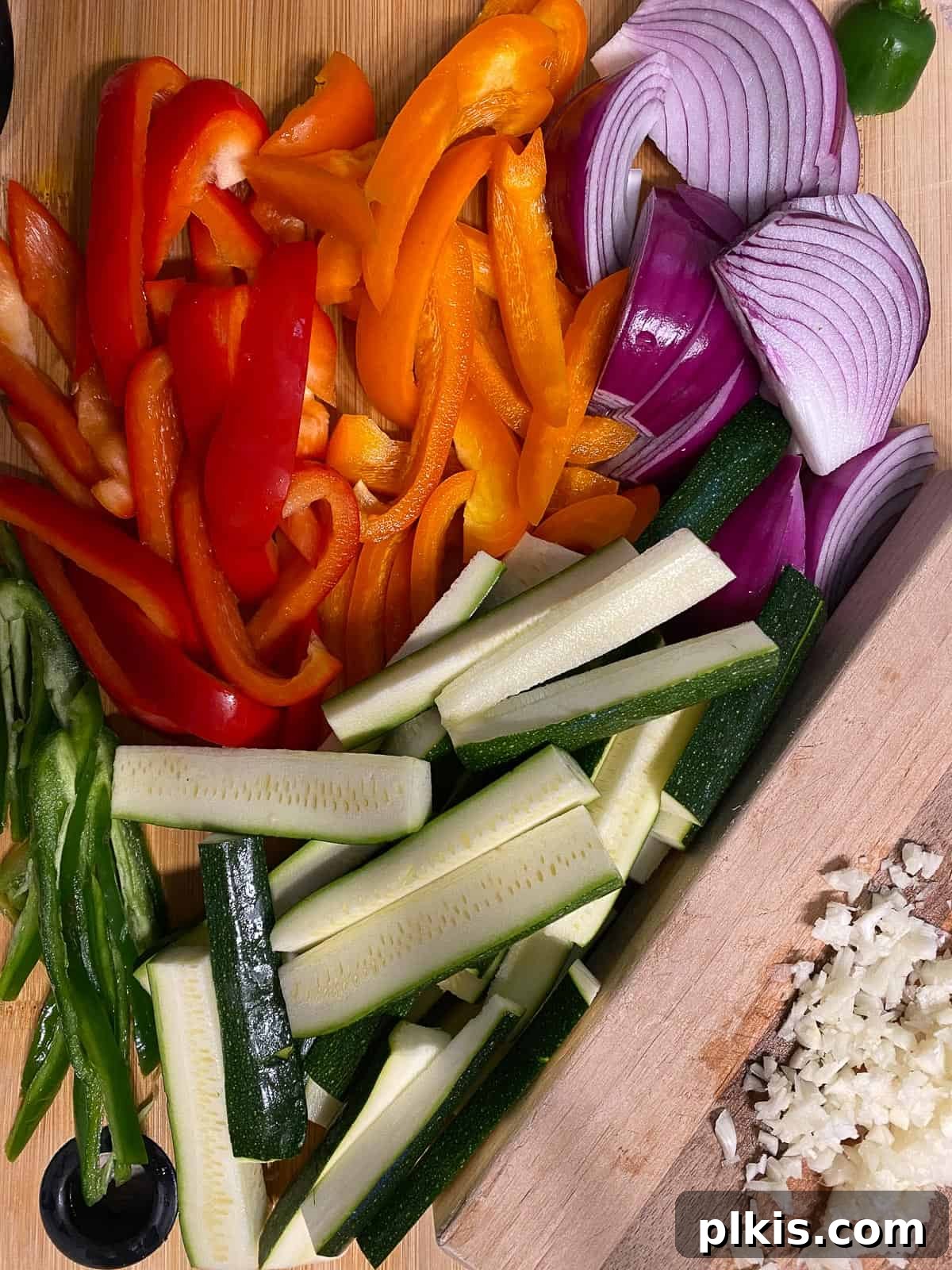 Sizzling Plant-Powered Fajitas 6 sliced veggies on a cutting board
