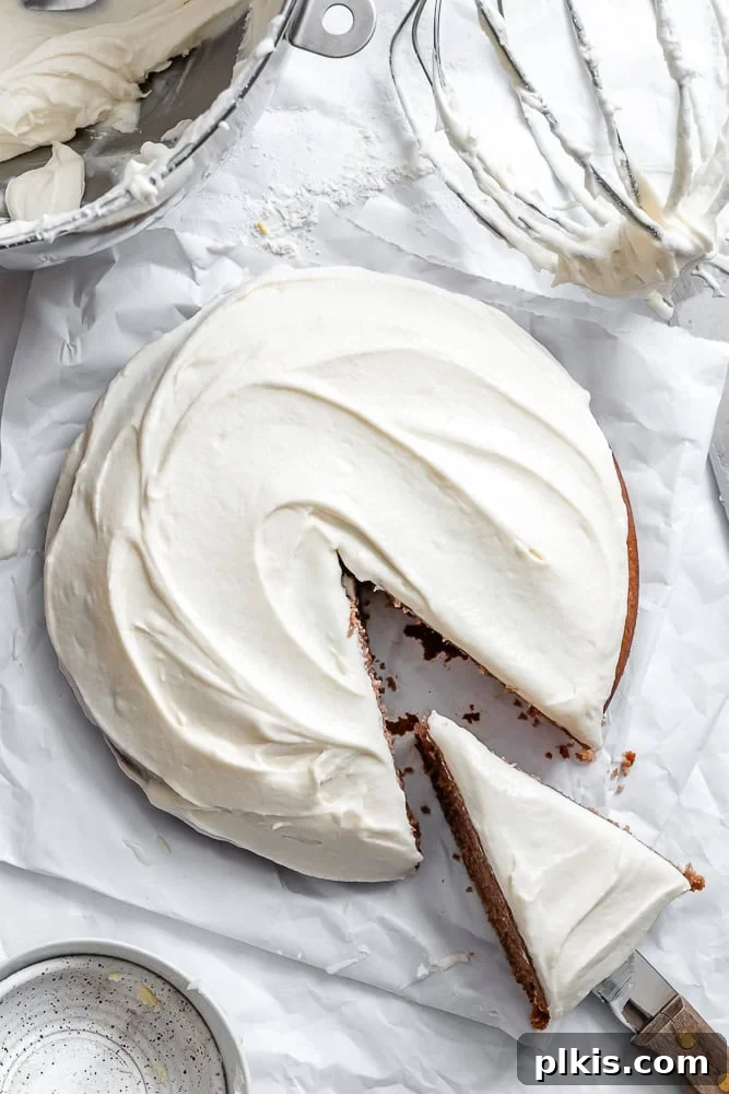 Plant-Based Red Velvet Perfection 2 A perfectly baked and frosted vegan red velvet cake sitting elegantly on a pristine white surface, ready to be served and enjoyed.