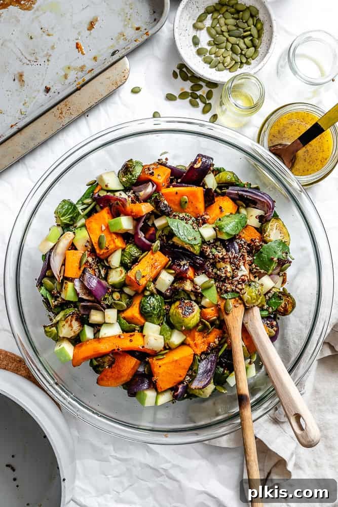 Golden Harvest Quinoa Salad 2 A vibrant bowl of Fall Quinoa Salad featuring roasted vegetables, apples, and a rich dressing.