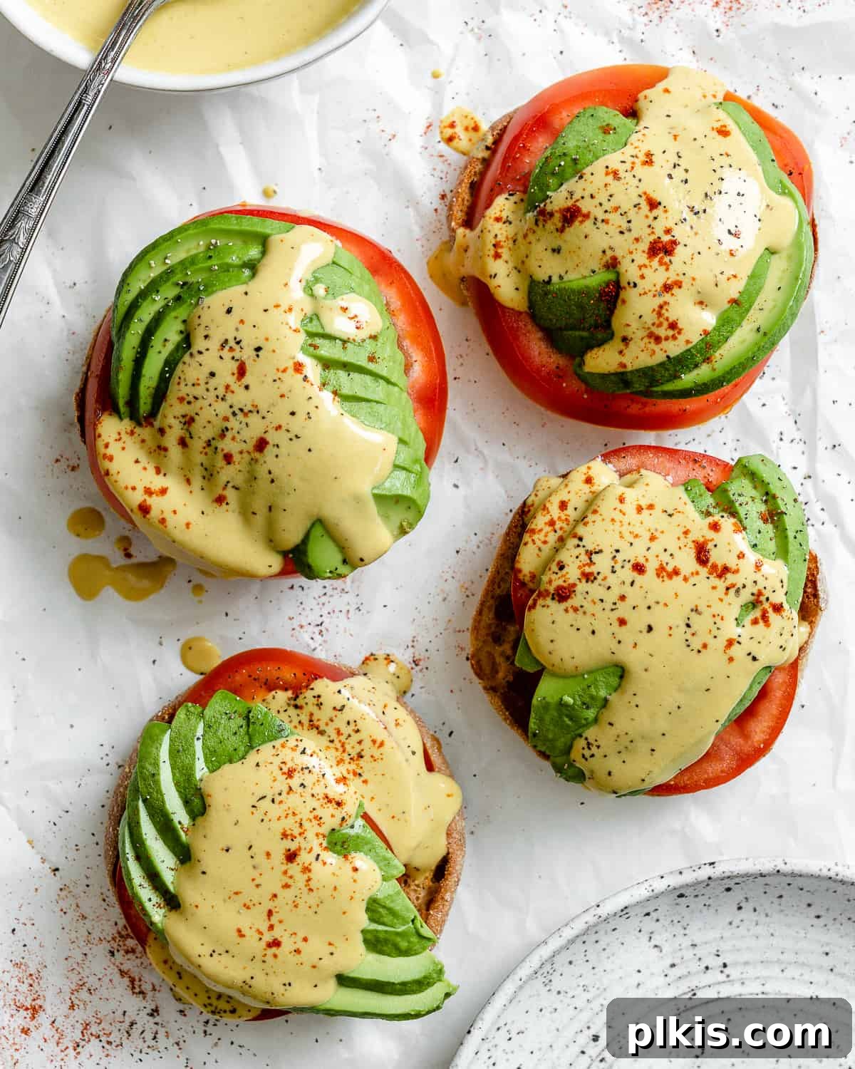 Simple Plant-Based Hollandaise 2 completed Easy Vegan Hollandaise Sauce against a white background