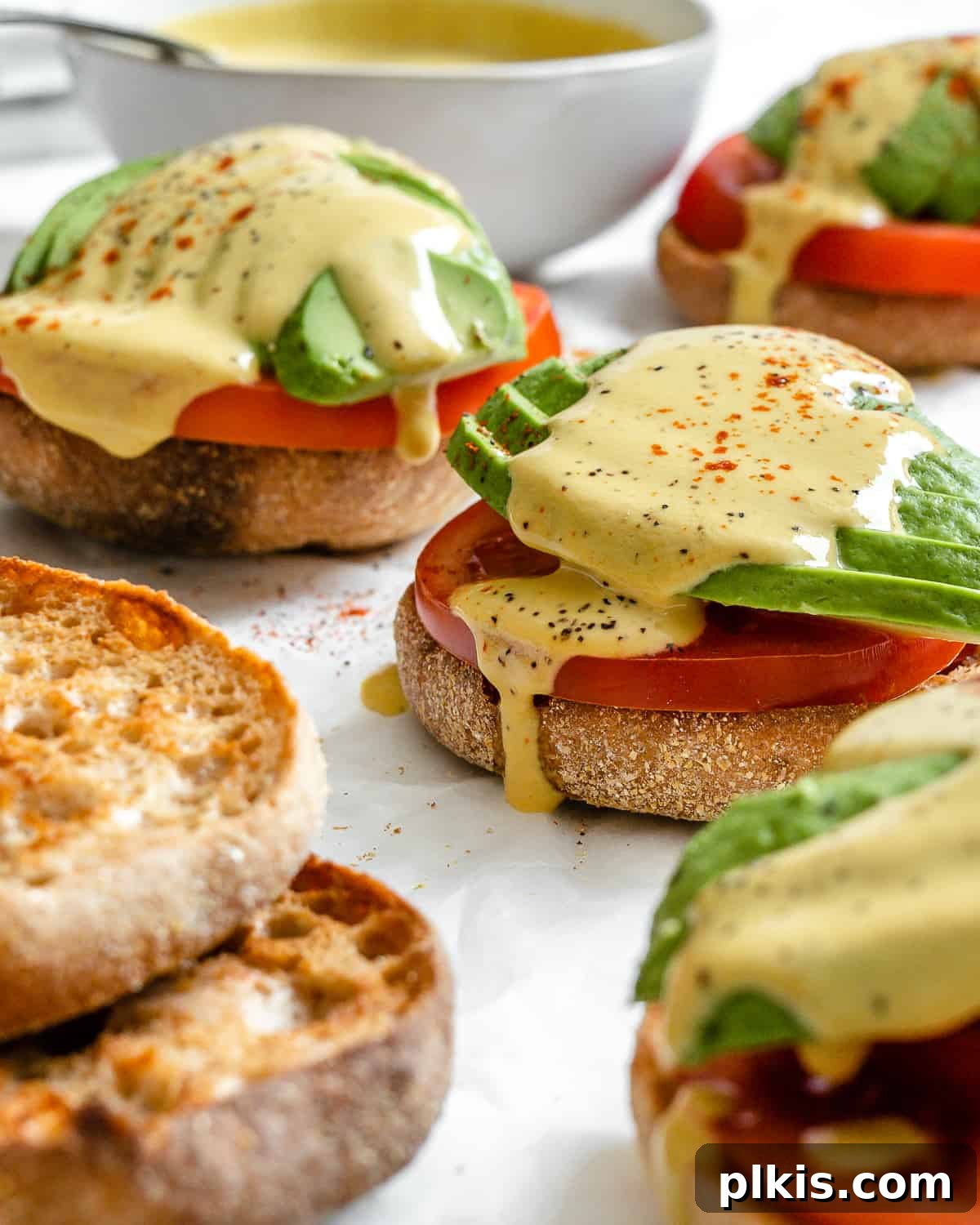 Simple Plant-Based Hollandaise 7 completed Easy Vegan Hollandaise Sauce against a white background