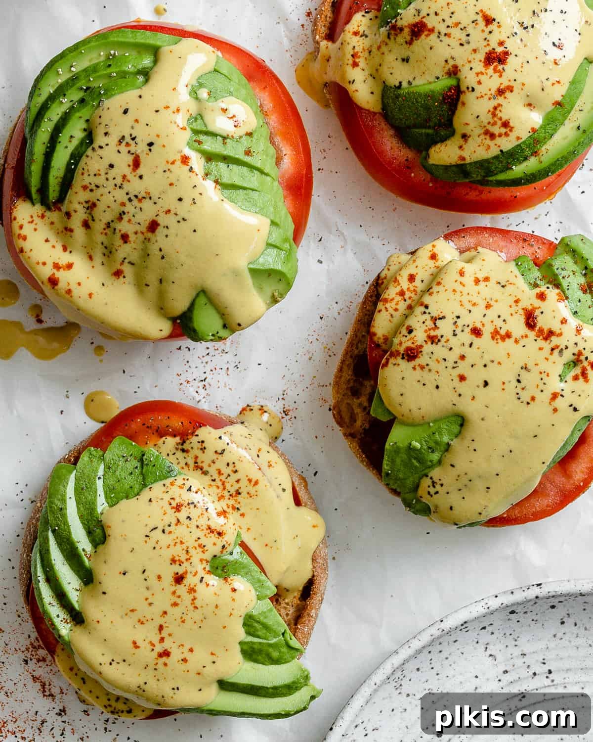 Simple Plant-Based Hollandaise 8 completed Easy Vegan Hollandaise Sauce against a white background