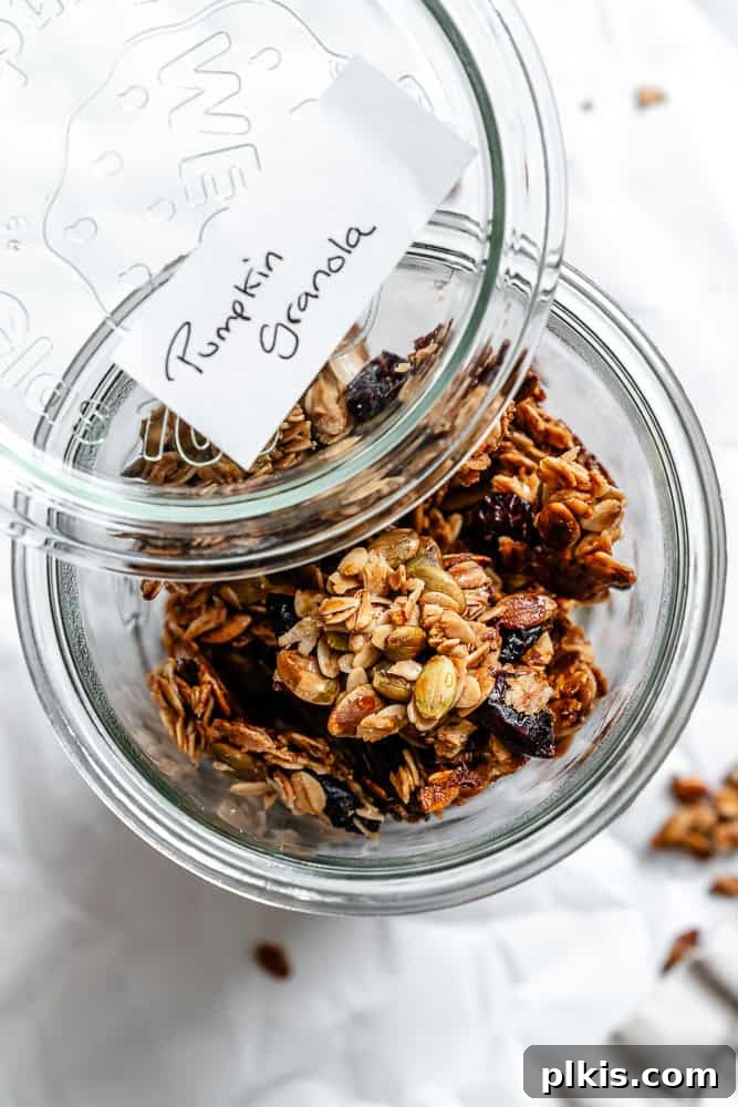 Spiced Maple Pumpkin Crunch 7 Completed Maple Pumpkin Granola neatly stored in an airtight glass container