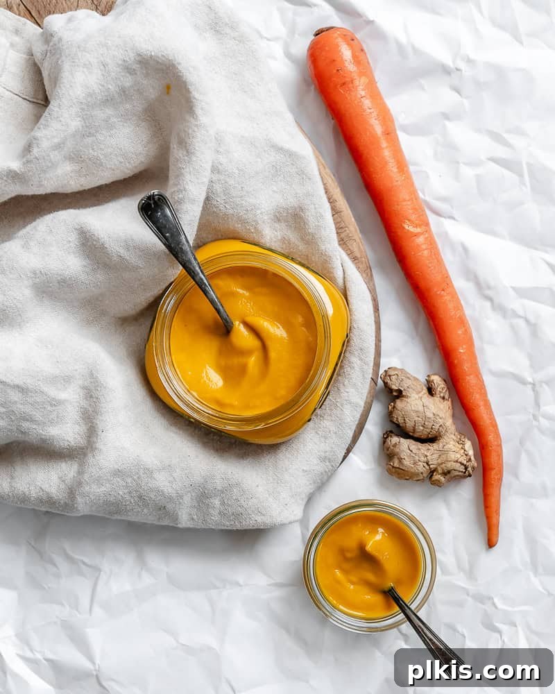 Vibrant Japanese Carrot Ginger Dressing 8 completed Japanese Carrot Ginger Dressing in a glass jar, showcasing its vibrant color