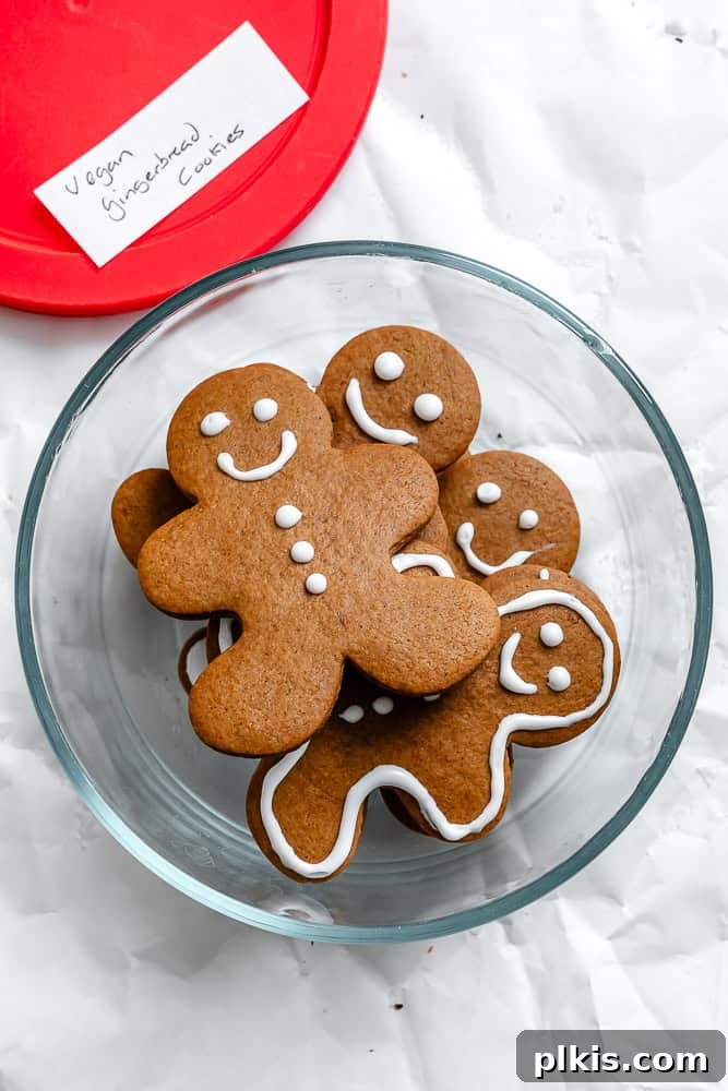 Cozy Vegan Gingerbread Delights 11 A bowl filled with completed Vegan Gingerbread Cookies, ready for sharing or enjoyment.