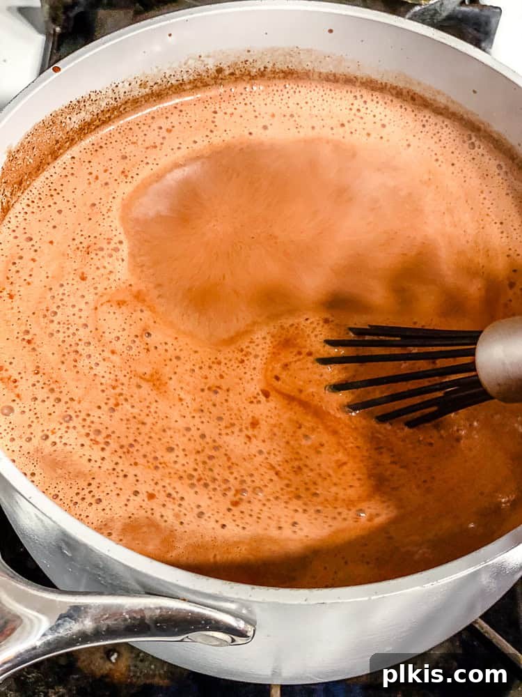 Guilt Free Chocolate Bliss 5 process shot showing stirring ingredients in pot with whisk
