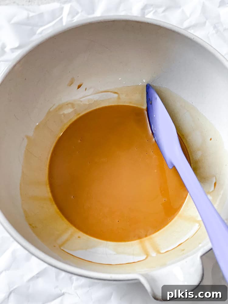 Tangy Orange Tofu Crunch 5 process shot showing mixing tofu mixture in bowl