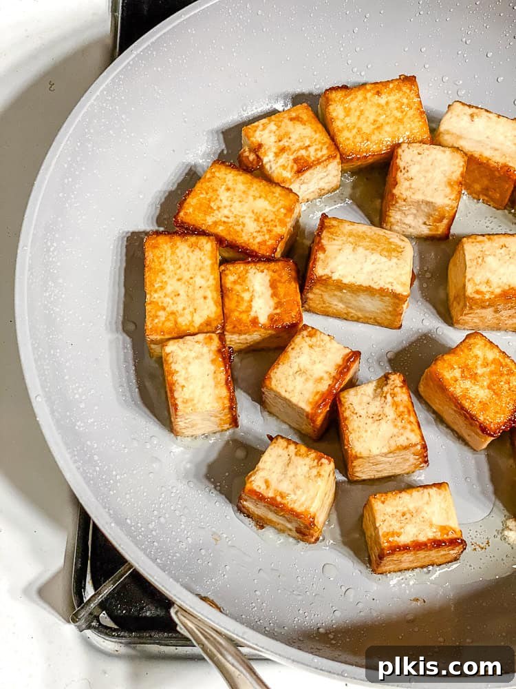 Tangy Orange Tofu Crunch 6 process shot showing cooked tofu on pan