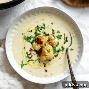 Golden Roasted Cauliflower Bisque 9 completed Roasted Cauliflower Soup in a bowl