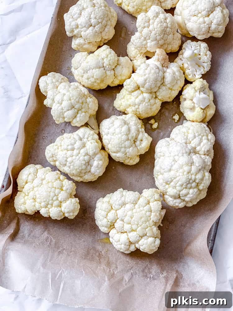 Golden Roasted Cauliflower Bisque 4 process shot showing cauliflower on baking sheet