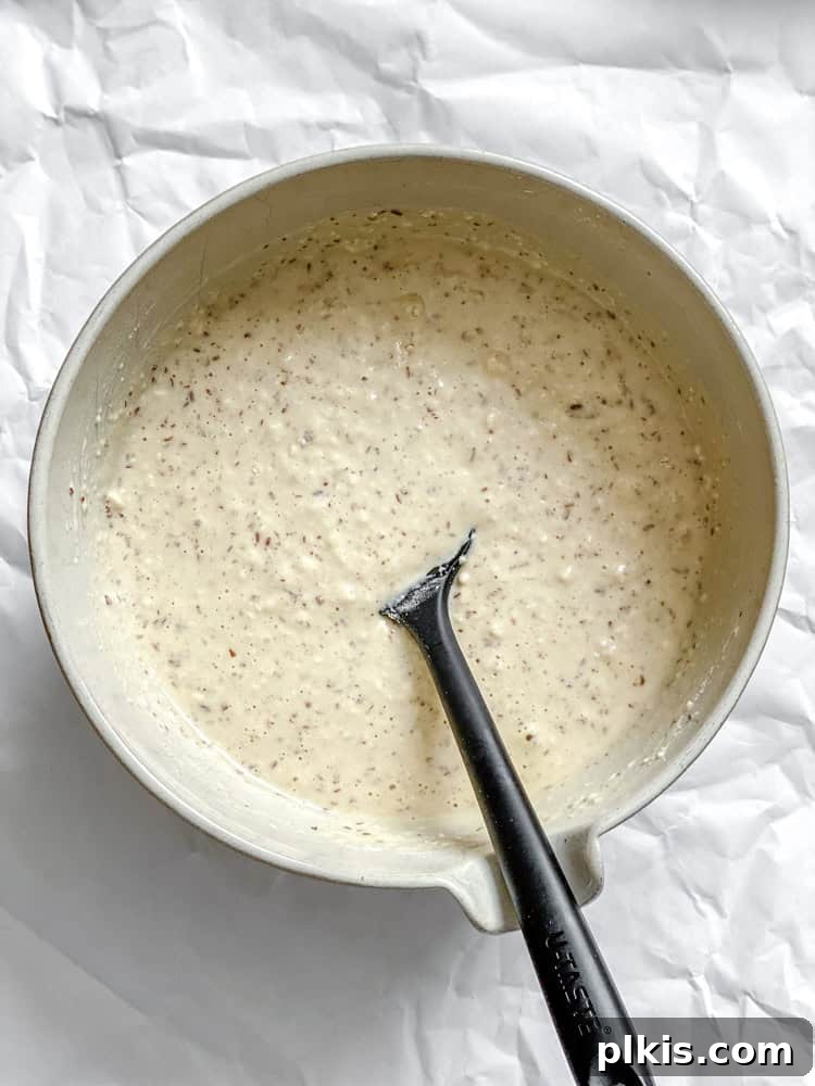 Fluffy Vegan Power Cakes 6 process shot showing mixing ingredients together in bowl