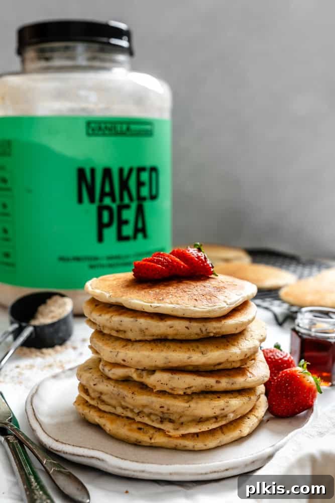 Fluffy Vegan Power Cakes 8 completed Vegan Protein Pancakes stacked on one another
