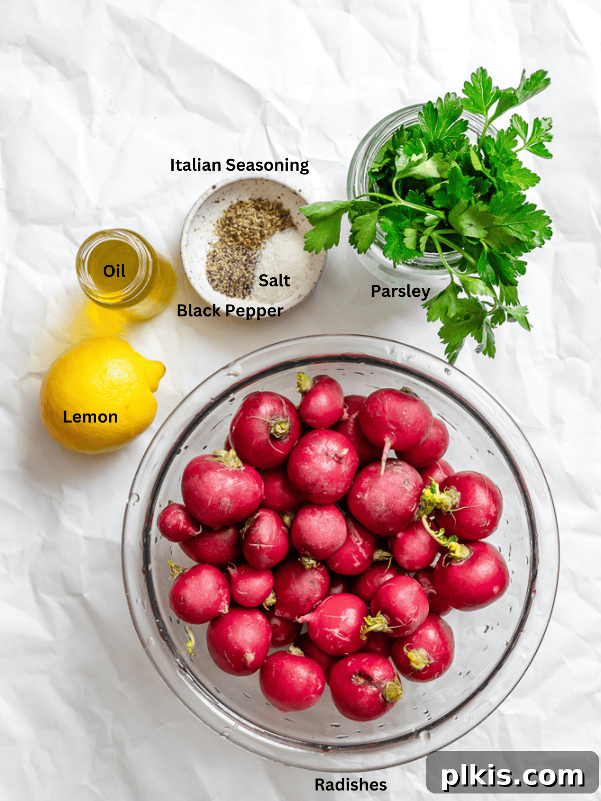 Roasted Radish Revelation 3 All the fresh ingredients for roasted radishes, including radishes, olive oil, lemon, and seasonings, laid out on a white surface.