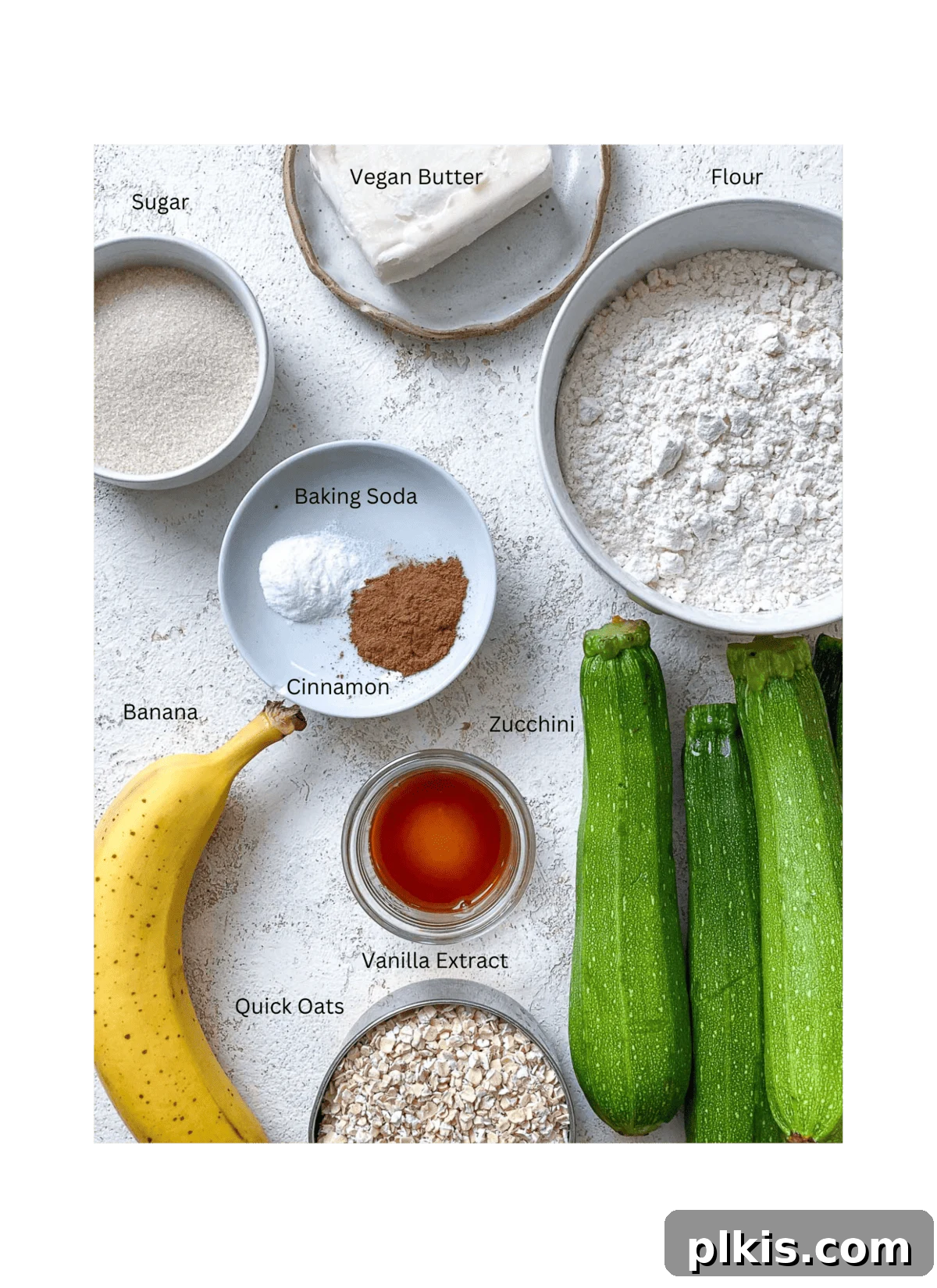 Wholesome Zucchini Oat Delights 3 ingredients for Oatmeal Zucchini Cookies measured out against a white surface