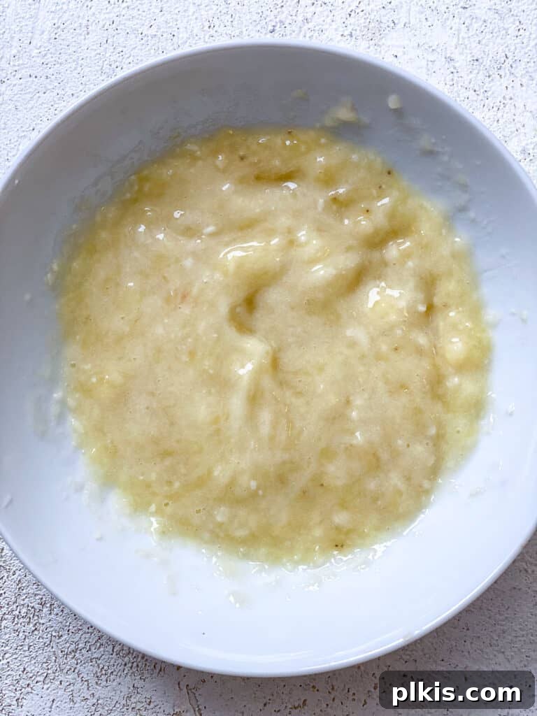 Wholesome Zucchini Oat Delights 6 mashed bananas in bowl