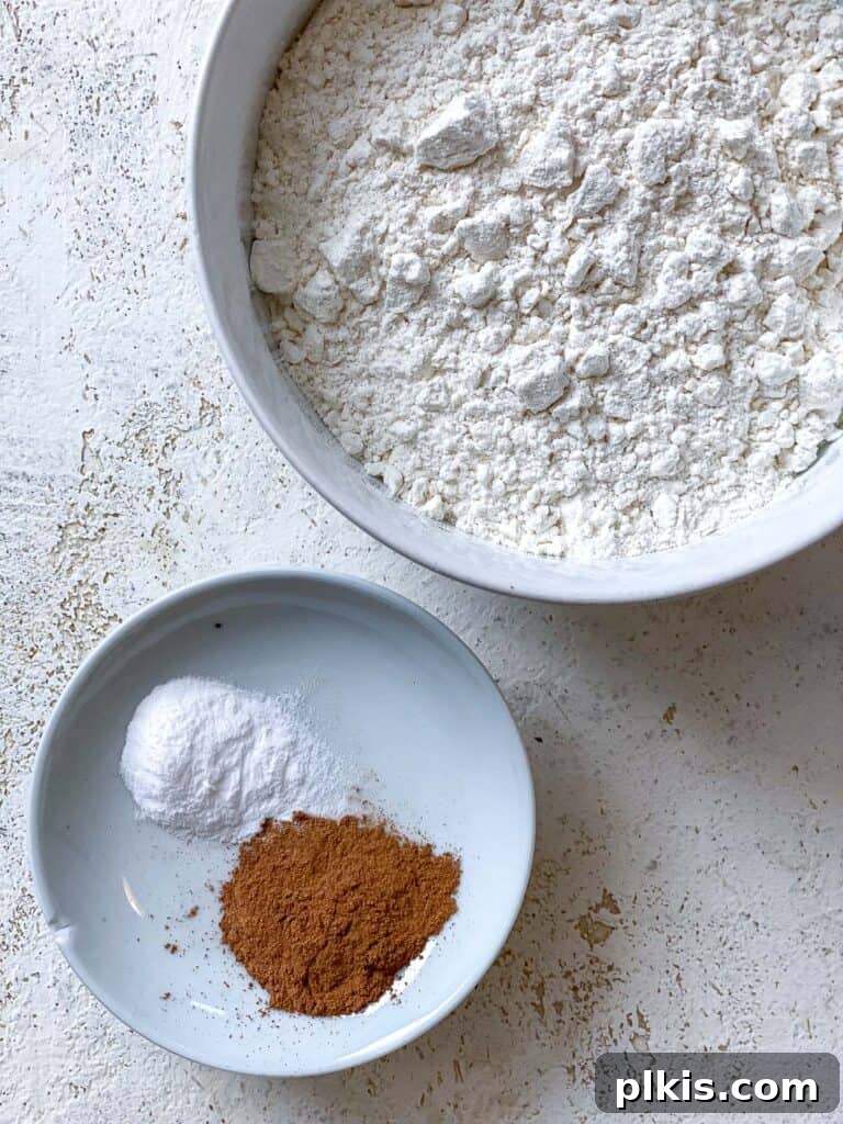 Wholesome Zucchini Oat Delights 7 ingredients for Oatmeal Zucchini Cookies measured out against a white surface